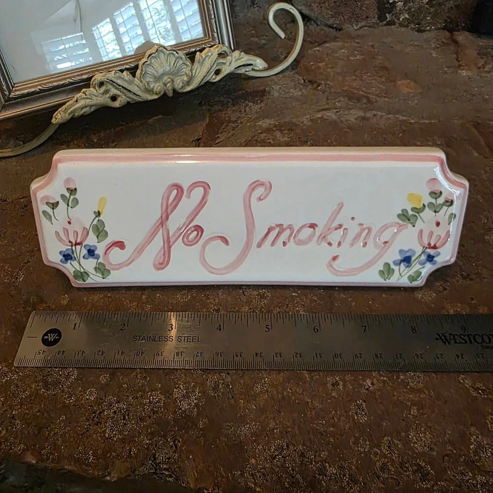 The Import Collection pink sign